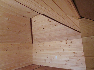 attic she shed wood paneled walls and ceiling
